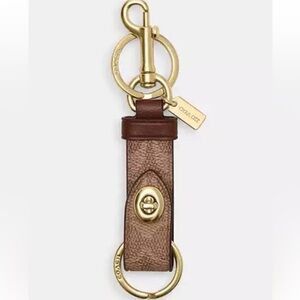 Coach signature turn lock Key Holder bag charm nwot fully inclusive